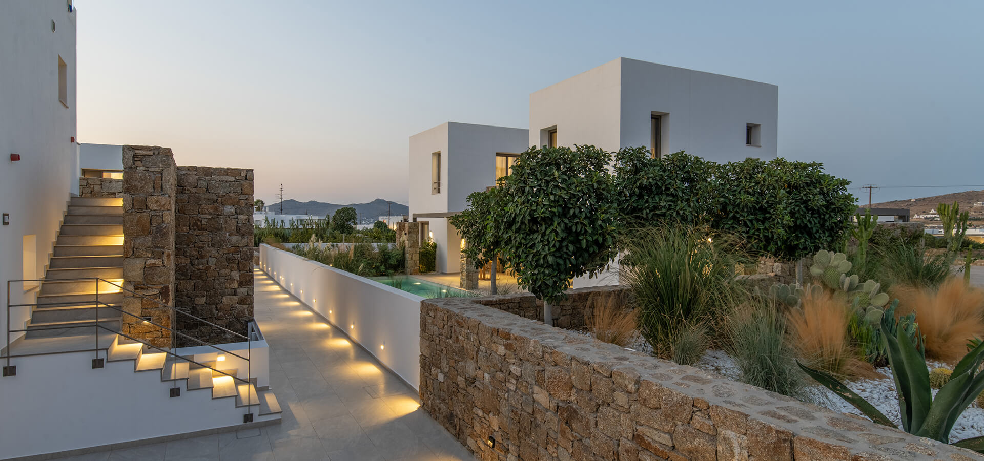 Illuminated alleys and Cycladic architecture in Omvrodektis Village, Mykonos